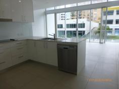 2/82 Marine Parade Southport Qld 4215 SOHO Loft Style Apartment - 2 Bedrooms/2 Bathrooms plus study.  Located directly above a retail strip in the H2O Broadwater complex we have the one SOHO apartment available.  Lower level consists of large tiled open plan living/dining/kitchen area with double height ceilings with floor to ceiling glass opening onto your own private large balcony. Also on this level is the laundry and 2nd bathroom. The Upper level has two bedrooms with WIR to Master, 2 way bathroom, 2nd bedroom has built-in cupboard and also on this level is a large separate study nook. These apartments have fully ducted air-conditioning, smart wiring, dishwasher and clothes dryer. What a perfect place to live whilst running your retail business downstairs 