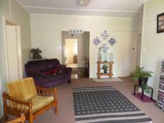  Gatton QLD, 4343 Roomy lowset 5 bedroom home on concrete stumps. The country style kitchen and dining room boast polished timber flooring and the separate lounge room is carpeted . There is a good sized front porch/verandah and new front fence. Large block with fully fenced back yard with 3 car carport and 4m x 9m shed with power. Walking distance to town and services. The possibilities are endless and including continuing with current tenant, renting rooms individually, renovating/extending the house or just a great house for a large family to live comfortably. 