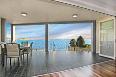  4 Ross St Belmont NSW 2280 If you have a passion for the water and appreciate the picturesque beauty of Lake Macquarie, then I invite you to inspect this stunning 3 year young luxury waterfront home. This warm and welcoming home is an idyllic haven for large families. Situated in a highly coveted location with south facing views this immaculate contemporary family home features a generous internal floor plan showcasing customised finishes throughout. The home is luxuriously appointed and features a sensational top floor master suite with private balcony, ensuite and walk-in robe. Combined living and dining flows effortlessly from the modern kitchen and opens onto a spectacular entertaining area which again takes in the water view. Upon entering this home, it is impossible not to admire the brushbox flooring which features throughout the home. The large detached pool house with its own kitchenette and bathroom flows out onto the solar heated magnesium swimming pool. The yard and gardens are low maintenance and minimal. There are a total of four bathrooms, four double bedrooms all with oversize wardrobes, a large office area, 2 separate living areas – one of which combines the caesarstone gourmet kitchen with a 6 burner gas cook top. The cosy fire place is supported by natural gas to the home. The home has ducted air-conditioning on the first level and 2 split systems on ground level. The garage is 7.1m wide and 6.48m long. There is provision to additionally park a boat or van. One of the finest homes on the market, it is only moments to village shops, restaurants, public transport and local facilities. If you’re all about kayaking, sailing, fishing, skiing or just want to enjoy the simple pleasure of this grand home then I will be delighted to accommodate you for a private inspection. Land size 582m2 