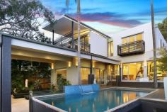  193 Gannons Rd Caringbah South NSW 2229 Superbly appointed with a remarkable level of quality finishes, this architecturally designed 6 bedroom residence possesses a variety of living options. Multiple living areas, balconies & alfresco entertaining make this impressive home a unique opportunity in a blue chip location. Features include; 2 bedroom self contained apartment, home office, salt water pool with solar heating, rumpus room with fire place, home theatre, open plan kitchen with walk in pantry and ample off street parking. 