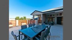 71 Casuarina St Bridgeman Downs QLD 4035 Offers Over $699,000 This fabulous lowset home on a landscaped 813m2 block in a family friendly, quiet street in highly sought after Bridgeman Downs offers you a comfortable and easy care lifestyle that provides practical elegance with a wonderful floor plan. Complete with four bedrooms, two bathrooms, multiple living areas, media room, double lock up garage, generous sized kitchen with quality appliances & granite bench tops, covered alfresco entertaining area overlooking a lovely water feature with built in BBQ, perfect for entertaining family and friends this summer! Located in a peaceful, safe, suburban street; this home reflects fantastic value in a blue chip location... Accommodation Features: 4 bedrooms, master with ensuite and walk-in-robe Family bathroom 10 ft ceilings Media room with projector and screen Formal dining room Formal lounge Modern kitchen with quality appliances Double garage with loads of storage space/cupboards Fans and air-conditioning throughout Quality window furnishings Alarm System Panoramic View Water tank 2 Garden Sheds Thermal Efficient blinds Water Feature Built in BBQ Low maintenance garden Fully enclosed garden