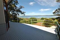  40 West Crescent Culburra Beach NSW 2540 "ON GOLDEN POND" $695,000 Stunning – this is the one word that describes the location of this unique property. Fronting on to Lake Woolumboola and possessing outstanding views this architect designed home captures all that is on offer with its desirable features. You can enjoy the natural wildlife of the lake while sitting inside the home or enjoy it all from your front deck. Witness the ever changing landscape that comes with owning property in such a rare location. The home is split level in design with all of the living areas looking out over the water. There are three bedrooms with the main having en-suite and walk in robe and the other two have built ins. Raked ceilings and exposed beams are a feature here along with a combustion fire and split system reverse cycle air conditioning. Extensive landscaping completes what is a truly unique property that will only be appreciated with an inspection. For further details contact Brian Muller at Culburra First National on 4447 3600. Map Data Terms of Use Report a map error Map Satellite 50 m  Property Type House  Property ID 11646100346  Street Address 40 West Crescent  Suburb Culburra Beach  Postcode 2540  Price $695,000  Land Area 990 sqm  
