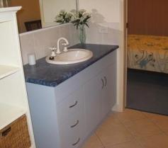  1/14 Raleigh Street Ooralea Qld 4740 Property Outline This 2 bedroom unit is fully furnished with tasteful and modern furniture and is totally self-contained, all you will need is your personal belongings. The lounge room has a large split system air conditioner and both bedrooms are also air conditioned. Both bedrooms have built in wardrobes, ceiling fans and are carpeted. The bathroom is 2 way from the main bedroom. In the well-appointed kitchen you will find a large stainless steel fridge and microwave along with all the other utensils, cutlery and crockery required. All living areas are tiled. The single lock up garage with remote roller door has a large storage cupboard. A private courtyard has a large outdoor setting along with a BBQ. The rear outdoor paved area houses the wheelie bins and clothesline. NO PETS Property Specifics Property Type: Unit Cost: $380.00 Bond: $1,520.00 Bedrooms: 2 Bathrooms: 1 Carports: 1 