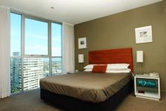  Surfers Paradise, QLD 4217 Ocean & Broadbeach Views Here is an opportunity to own a prestigious 2 bedroom (1+1) apartment in a stunning 30 level Raptis high-rise.  Each apartment has ducted personal control air-conditioning, spacious open plan living areas and generous balconies. The kitchens are fully equipped with quality European appliances. You will notice the high standard of finishes and inclusions throughout as well as acoustic treatments which exceeds Australian standards.  Facilities - Lifestyle and Recreation:  - Private theatre room for resident use  - Heated indoor merging outdoor swimming pool  - Spa  - Sauna  - Steam room  - Fully equipped gymnasium  - Virtual Golf simulation games room  - Poolside barbeque and entertainment area  Location:  - Located beachside in Surfers Paradise, 150 metres from the beach  - Contemporary design  - Ageless quality  - Sculptural form  - Lush tranquil landscaped gardens synonymous with Raptis developments  - Elegant entry with exclusive facilities to complete a quality lifestyle  - An easy stroll to Surfers Paradise shopping precinct and night life  - Minutes to Casino, Pacific Fair and the new Gold Coast Convention Centre. 