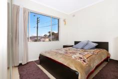  76 Rossmore Ave Punchbowl NSW 2196 This big fully updated modern unit with Balcony , is tiled through out and renovated with no more to spend , and only 5 minutes walk to train-station and shops and 1 minute walk to local school * Huge 103.2 m2 approx (total) * Tiled through out * Fully updated middle floor * Modern eat-in kitchen * Air-conditioning * 2 Bedrooms with built-in in main * Internal laundry * Lockup Garage * Minutes (walk) from all amenities * Rental potential $380 Inspection is a must !!!!!! 