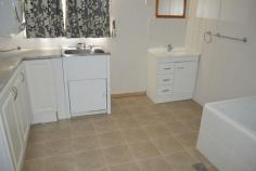  16 Little Barber Street Gunnedah NSW 2380 Great value and in a handy location being walking distance from the CBD, schools and sporting facilities. The home offers 3 good sized bedrooms 2 rooms with split system air conditioners, good sized living room with a wood fire and wall mount A/C. modern gas kitchen with a dishwasher, neat and tidy bathroom and laundry with separate toilet. Fully fenced back yard with a single lock up garage and carport. This home is a must to inspect. 
