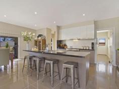  6 Nyah Ct Broadford VIC 3658 A modern contemporary styled home with 
instant appeal. Its functional floor plan maximises space with 3 
bedrooms, double garage and two separate living areas. 
Master suite with walk through ensuite and large walk in robe, 
additional bedrooms both with built in robes and well-appointed main 
bathroom with separate toilet. 
The kitchen boast ceasear stone benchtops, 900mm appliances, dishwasher,
 ample storage all accompanied by large walk in butler's pantry. 
Open plan dining and family room present the ultimate in functionality 
with sliding doors opening out onto the extensive merbau decking 
entertainment area. Overlooking the great sized yard with side access, 
wood shed and manicured gardens. 
The home is tastefully designed with particular attention paid to the 
finest fittings and fixtures throughout. Nectere wood fire and 2 
heat/cool split systems, perfectly positioned full functioning laundry 
room, 9 foot ceilings, and tailor made roman blinds throughout. 
Inspection is a must! Call Gavin Henderson 0408 359 764 
 
 Read more at http://broadford.ljhooker.com.au/4THJS#QVyGfjkAjulHwv8K.99 