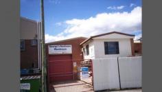  50 Lansdowne St Merrylands NSW 2160 LARGE PROPERTY WITH 2 STREET FRONTAGES: - FACING EDWARD BUGGY ROAD IS: LARGE 370 SQM WAREHOUSE & OFFICE - FACING LANSDOWN STREET IS: 3BR FULLY RENOVATED HOUSE WITH BUILT IS, EN SUITE AND SEPARATE DINING Land size: 1000 SQM Potential Income: $ 1,200 per week 