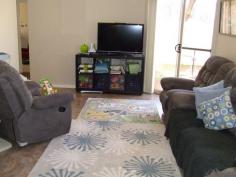 5/9 Joaquina Street York WA 6302 A Unit For Sale in York?! Very rare opportunity to purchase an easy care modern unit in York!  This 3 bedroom unit boasts a single garage with an additional carbay, an open kitchen/family/meals, seperate lounge room, 2 toilets, split system airconditioning, big courtyard and a store room. The short walk to the shops from here is as easy as you will find.  Buy now as an ideal investment, future retirement planning or just to downsize to an easy care home. Currently lease to the government (GROH) until January 2015. To view this property, please call:  Brian Wheeler - 0429 119 123 LJ Hooker York General Features Property Type: Unit Bedrooms: 3 Bathrooms: 1 Building Size: 105.00 m² (11 squares) approx Land Size: 227 m² (approx) Price per m²: $1,454 Indoor Features Ensuite: 1 Living Areas: 2 Toilets: 2 Built-in Wardrobes Dishwasher Split-system Air Conditioning Outdoor Features Garage Spaces: 1 Open Car Spaces: 1 Courtyard 