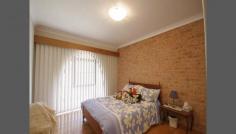  Roseville NSW 2069 There is plenty of scope for the growing family in this solid full brick family home. Architecturally designed and built in 1979, this home offers spacious formal and informal living areas. Full brick construction situated in a quiet child safe cul de sac with peaceful bushland views of Ku-ring-gai National park on 825 (approx) m2 of land. Features include: * Generous sized main bedroom with ensuite  * 3 additional bedrooms, two with large built in robes * Formal dining room flows to lounge with 16' cathedral ceilings  * Modern kitchen with granite benches and plenty of cupboard space * Large open plan family area adjacent to the kitchen including a separate area with wood burning slow combustion fire * Beautiful black butt timber floors throughout the family and bedroom areas  * Spacious double lock up garage with level entry to the family room and kitchen * Downstairs is a large area suitable for home business, in law accommodation or self contained granny flat the option is yours 