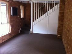  6/125 Rous Road, Goonellabah NSW 2480 With park opposite and Goonellabah Shopping Center nearby this well maintained unit will suit a variety of buyers. Downstairs is a functional kitchen, living area, laundry, second toilet, and single lockup garage with internal access. Three bedrooms upstairs all with built-ins and balcony off main, bathroom and separate toilet. Level yard with carport for additional parking. 