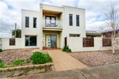  8 Hinton Street Port Noarlunga SA 5167 Premium Location - Premium Property Two Storey Townhouse in Port Noarlunga. Neat as a Pin... Spacious... Modern & Appealing! Set in the highly sought after suburb of Port Noarlunga, this well presented 2 level townhouse offers perfect location, idyllic lifestyle or a wise investment to the discerning buyer! This quality built townhouse offers a combination of space and ambience with everything at your doorstep, while boasting an abundance of features including :- - 3 Spacious bedrooms. - Master with walk in robe & built in robe to bed 2. - Open plan living and dining area. - Modern kitchen with s/steel appliances including dishwasher. - Overhead cupboards & walk in pantry. - Large storage closet. - 2 Toilets - Large laundry room. - 4 Split System air conditioning units. - Large landing area leading out to a balcony with views. - Private courtyard area with a gabled Pergola. - Security shutters. - Double garage with auto door and internal access. - Easy walk to Colonnades Shopping Centre, Schools & Transport. - Minutes from the Port Noarlunga Township & the best beaches SA has to offer. General Features Property Type: Townhouse Bedrooms: 3 Bathrooms: 1 Land Size: 313 m² (approx) Outdoor Features Garage Spaces: 2 Other Features Property Type: Townhouse 