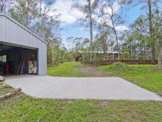  167 Tarata Rd Guanaba QLD 4210 $850,000 - $889,000 This property is a fresh representation of
 tranquil and rural Gold Coast living! Set on an impressive 3.2 
Hectares, a multitude of different opportunities await one lucky buyer. 
This property has distinct character and charm with precise quality in 
the build of this exquisite home, from the brick work to the vaulted 
high ceilings this home has an honest 'retreat feel'. The open plan 
living space is truly inspiring with the rock feature wall and the 
parquet flooring; natural light floods this space with a magnitude only 
seen in majestical properties. The kitchen/ dining is mutli functional 
with good cupboard space and bench space to suit. The standard 4 
bedrooms and 2 bathrooms also accompanies this purchase that includes a 
master en-suite and extremely large main bathroom. 
 
So many possibilites are in existence on this block, with 2 large dams 
and a large shed with power, one can set up a hydroponic farm, multiple 
vegetable patches or horse paddocks. At the front of the property 
there's also a Care Keepers cottage that acts as a second dwelling. This
 is a must inspect for all buyers seeking a special and multi functional
 property! 
 
Main House Features Include: 
Brick Construction 
Metal Roof 
2 Expansive living areas with AC 
4 bedrooms 
2 Bathrooms 
Septic Tank 
Water Tank 10,000 gallons 
Wrap around deck 
 
The Block 
Shed with Power 
2 x Dams with pumps 
Chook pen and hut 
Usable land 
Green Room 
Water Irrigation System 
2nd Dwelling 
 
The property is approximately only 7-10 minutes away from Nerang and 
Pacific Pines where you will find your major shopping centres, schools, 
M1 and local Cinema. This life style property is here to be SOLD and the
 owner is motivated to sell. 
 
 Read more at http://pacificpines.ljhooker.com.au/MH7GMK#f6KvycGLPixpHekp.99 