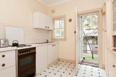    9/26 Kidman Street Coogee  NSW 2034 Located in the heart of Coogee this unique apartment is brimming with character. The high ornate ceilings provide a sense of space while wood framed doors & windows enhance the property’s Art Deco period charm. The practical design incorporates a separate entrance in the kitchen through which residents can access the rear yard with ease. Accommodation includes an enormous master bedroom that includes a built-in wardrobe and a second bedroom or study accessed via the main bedroom or lounge. Positioned away from the main street the apartment has no common walls for added peace and quiet. The location is convenient to local shops and transport routes and within walking distance to the beach. This property is an affordable option for the first home buyer and the popularity of the location means that investors can be assured of minimal vacancy rates between tenancies. 