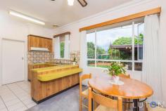  5 Fairfax Street, O'connor ACT 2602 Standing proudly on an outstanding block of approximately 1,137m², this privately built, solid brick family home offers great flexibility. Move in and enjoy 'as is', or should you require it there is plenty of scope to extend or redevelop to suit your needs. In a sunny location, this special home has great street appeal and is splendidly positioned facing north. Featuring an entrance hallway, soaring 10' ceilings, large and separate lounge room, open plan dining & kitchen and each of the three generous bedrooms provide built in robes. A bonus is the potential studio which is separately metered and has its own bathroom. Another structure is also separately metered. 