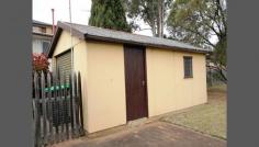  60 N Liverpool Rd Heckenberg NSW 2168 Located in an elevated position is this North facing circa 50's single storey fibro home on a large 714.5m2 parcel of land comprising of; - 3 bedrooms - original kitchen - neat and tidy bathroom - spacious living area - single detached lock up garage - 714.5m2 block  The property has potential to build a granny flat (s.t.c.a) and is located close to all amenities with the bus stop at your doorstep. 