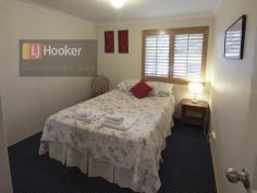  7 Brown Street Busselton WA 6280 GUEST HOUSE OPPORTUNITY This 7 bedroom self contained guest house operating as a B&B and holiday accommodation has shown an increase in returns over the past two years. The property itself is only 11 years old which would sum up good depreciation benefits. Walking distance to all restaurants and nightlife only 200 metres to town, 150 meters to the sparkling shores of Geographe bay it is the best located bed and breakfast in Busselton. There is building approval for two more dwellings off the current dwelling, making it one of the most appealing guesthouses to purchase for income potential. Bitumised chocolate driveway and parking bays for guests, the landscape sets one of peace and tranquillity, which is what entices the many repeat guests come back to stay again. The kitchen is self equipped, but the guesthouse also holds a food licence which ads scope for another income stream in the food department, cater a group or function or host some cooking classes. Enjoy a glass of Margaret river wine on the decking in the yard, or have an outside meal in the sheltered courtyard. You don't have to go out to enjoy the luxury this lodge offers. All rooms come with reverse cycle air-conditioning. General Features Property Type: House Bedrooms: 7 Bathrooms: 5 Land Size: 874 m² (approx) Outdoor Features Carport Spaces: 6 