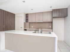  11/6 Lutana Street Stafford Qld 4053 Offers Over $439,000 If you have been looking for an apartment that ticks all the boxes for size, lifestyle and convenience, then look no further. This as new 2 bedroom, 2 bathroom apartment with approximately 40sqm terrace courtyard has so much to offer that you can't afford to look past it. Very rarely will you find a unit that flows so well, entering in from the covered patio you walk into an air-conditioned, open plan living area with modern kitchen featuring stone bench tops and stainless steel appliances. Double sliding doors to the rear lead out onto a huge terrace with mature plants providing privacy, making this the perfect area for entertaining friends and family. Additional features include high ceilings throughout, two bedrooms both with built in robes, main bathroom with laundry, ensuite, secure car accommodation and blinds. The unit would ideally suit an owner-occupier or astute investor looking for a high quality unit in a superb street. Close by to transport, schools, shopping centres, parkland only across the street, take full advantage of this location with easy access to the Airport Link & Northern Busway tunnels reducing the trip to the CBD down to 15 minutes. Read more at http://stafford.ljhooker.com.au/8SKF4N#s6mrKVaTmcx85ZCp.99 