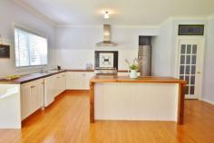 14 Payten Street Mittagong NSW 2575    Offers Over $670,000   	 This gorgeous residence exudes country charm yet is just under 5 years old.  * On nearly an acre of lawns, the home is set well back from the street to enjoy lovely garden vistas * Featuring high ceilings, wrap around verandah, wide hallway & spacious living areas * Large lounge room with combustion fireplace and outlook to the front garden * Open plan kitchen with lots of storage, timber benchtops & generous butler's pantry  * Dining area off the kitchen opening out via sliding doors to verandah * Separate tv/media room located off the hallway to the bedroom wing * Great size bedrooms, master at the front of the house with walk-in-robe & newly completed ensuite * Landscaped lawns, a variety of trees including hazelnut and pear * Gorgeous residence - ideal for families and retirees alike Property Details Bedrooms 		 4 Bathrooms 		 2 Land Area 		 3905 m2 