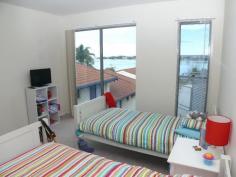  6 & 7/42 Main St - Merimbula , NSW Sunlit 3 bedroom, 2 bathroom townhouse 50 metres from the RSL and 200 metres to the centre of Merimbula. Features include secure underbuilding parking, intercom entrance, lake views and a massive deck to take full advantage of the north sun. Ideal for those looking for low maintenance living in a very convenient location