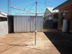  2/18 Ward Street Whyalla SA 5600 $190,000 What a little beauty, situated in prime location this two bedroom unit is one not to miss. Offering large lounge room with air-conditioner and high ceilings which continue right through creating that spacious feel. Carpeted throughout main areas, kitchen being vinyl floor covering. Original, but clean and tidy bathroom/toilet with separate bath to shower. Main bedroom large with ceiling fan with second bedroom being of generous size also. The original kitchen/dine room overlooks the city of Whyalla and leads to the laundry which leads to rear yard. Rear yard has been cemented for low maintenance and includes garden shed. Front yard with carport and low maintenance garden. Land area approx.: 206m2. For the investor, property is currently tenanted at $250/week until 22/12/2014 fully furnished. 