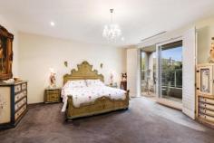  2/18 Grange Road Toorak VIC 3142 Superb first floor apartment designed by Wayne Gillespie (1 of 3) located directly opposite the Toorak Village.  Comprising: Security entrance, lift, wide gallery hallway, granite kitchen, spacious living/dining room opening onto fantastic entertaining terrace, main bedroom (walk in robe and ensuite), 2 further double bedrooms (both with built in robes), fitted study/home theatre room, family bathroom, separate laundry and powder room.  Includes heating/cooling, parquetry flooring, basement parking for 2 cars and storage room. 