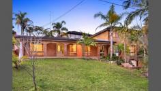  59 Honiton Ave W Carlingford NSW 2118 Price Guide Over $1,000,000 
 IMPRESSIVE FAMILY HOME, GREAT FOR ENTERTAINING 
 This elegant family home, situated
 in a desirable location, offers two spacious levels for appointed 
living. Located in a quiet and scenic area, surrounded by the beautiful 
Ponds Walk. This family home provides a tremendous opportunity to 
acquire a special property. -	Four double bedrooms with built-ins and a master ensuite -	Impressive formal/informal living areas -	Fantastic family lounge room, great for entertaining -	Stunning gourmet timber kitchen and gas cooking -	Ample sized study/office room -	A warm and well sheltered alfresco area -	Tile and timber floor/ ducted air -	Double remote control garages and additional parking space -	Ideal for a big family, sitting on a 700 sqm land close to transport and shops -	Located in close distance to schools, such as James Ruse High 
 