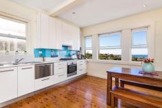  1/35 Moira Crescent Clovelly  NSW 2031 Commanding an elevated position, this semi-style ground floor art deco apartment boasts panoramic ocean and district views over Coogee. Having been stylishly modernised in recent years, the kitchen includes stainless steel appliances, gas stove, Caesarstone bench tops, dishwasher and dining area. High ornate ceilings provide a sense of space and compliment the apartment’s character features that include polished timber floorboards, window frames and picture rails. The master bedroom includes a built-in wardrobe and French shutters. An internal laundry space is provided and the rear yard can be accesed via a separate entrance . Bordering the suburbs of Coogee, Randwick and Clovelly Moira Crescent is a quiet, tree lined street, that provides convenient access to the various shops and cafes positioned on Clovelly Road. Transport routes to most destinations depart from Clovelly Road and Fern Street. This is a rare opportunity to secure a property that not only offers level access, but also provides residents with district, coastal and ocean views. 