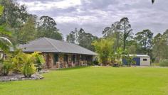  54 Whites Rd Landsborough QLD 4550 $649,000 With this huge modern home situated on 2.6 acres of prime land . 315 sq 
m2 under roof home comprising of 4 bed, 2 bath, study, separate lounge 
plus one of the biggest open plan living areas you could imagine. The 
master bedroom is approx. 6 mtr x 4 mtr, air con, and the en suite is 
larger than most bathrooms, allowing the feeling of grandeur here. All 
bedrooms are of a generous nature and the separate study and formal 
lounge areas provide space for everyone. The well appointed 
kitchen with its quality smeg appliances compliments the main living 
area and with this much space to enjoy, any family gathering would be 
accommodated with ease. Not only is there a double lock up garage 
attached to the home but also a separate 6x9 shed with another 2 car 
spaces plus workshop area. Hey boys bring your toys. The under 
cover out door area is a great place to park up and enjoy all the 
property has to offer with the kangaroos coming to visit with their 
babies, and with the sound of the native birds, you could think you 
were in paradise, but remember it will all be yours when you move right 
in! Partially fenced, with majority of it being cleared , and a
 lovely native treed area as well, the land is very usable and easy to 
manage. This has to be and will be the best buying in the area... so 
much land, so much house, at a price you wont believe! The 
positioning of this property down a short driveway taking you away from 
the road, allows for that ever sort after peace and quiet but still 
having the convenience of only being 5 mns from the town centre of the 
quaint historic township of Landsborough and its amenities and main 
train line direct to Brisbane, and 10mns from the new look Beerwah town 
with its expansion of the brand new shopping complex due to open soon. Wow so much on offer here.. 