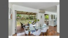Welcome to comfortable easy living, this charming character home enjoys a leafy location in the highly sought after Avenues of Ashgrove. Enter this lovely home with open plan living that flows through bi-fold doors onto large covered rear deck and you'll find a child friendly backyard perfect for entertaining. Although ready to move in, this property has potential to be further developed and would suit the growing family. Features: Situated on 716m2 of land Four large bedrooms with built-in robes & ceiling fans Main bedroom with Walk-in robe & window seat Study/Toy room Original features include VJ walls & polished timber floors Two modern bathrooms Separate formal dining or lounge Kitchen with stainless steel appliances & wine fridge Casual dining/lounge area which flows onto a covered deck North facing deck and backyard Established gardens and pergola Under cover car accommodation for 3 cars with remote control garage door Huge storage area under house Only 5.5kms from the city Walking distance to parks, bike tracks, bus and Ashgrove shopping precinct Surrounded by quality homes and fantastic schools such as Marist, Mt St Michaels Oakleigh & Ashgrove State school Inspect this home and you could be enjoying Christmas underneath the spectacular Frangipani tree in full bloom!