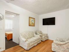  1/261 Station St Fairfield VIC 3078 Tucked away at the rear of a small group of 8, this easy living ground floor apartment features brilliant alfresco courtyard entertaining, north-facing living spaces and supreme convenience to a host of lifestyle essentials. An outstanding start-out option or savvy investment, exceptional well-lit comfort includes air conditioned living/meals room with contemporary timber floors, updated kitchen boasting quality stainless steel appliances, robed bedroom with en suite/laundry facilities, large covered outdoor deck/BBQ areas and car-space. Privately and securely fenced, this rare offering is just minutes to Fairfield Village, Fairfield Train Station, Fairfield Primary School, Wales Street Primary School, Supermarkets and Restaurants.  
