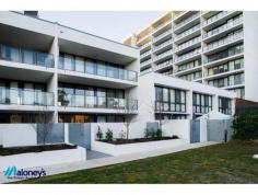  110 / 1 Mouat Street, Lyneham, ACT 2602 $529,000 Conveniently located in the highly sought after 'Axis' complex, this large, ground floor, 2 bedroom ensuite apartment features 104m2 of internal living space plus 81m2 of courtyards. Located within walking distance to both Lyneham & Dickson shops and the exciting new Braddon Precinct while still being 5 minutes' drive to the CBD, this property is a stand out. The light filled, expansive open plan living area features floor to ceiling windows & sliding doors that frame & lead directly onto the 2 large 43m2 north & south facing courtyards. With enough room to create an entertaining area with BBQ, dining table & additional greenery with pots & plants the outdoor balcony acts an extension to your living areas. The modern kitchen is beautifully finished & offers stainless steel appliances, dishwasher & stone bench tops with plenty of space to entertain & cook up a storm. 