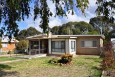  182 Mayne Street Gulgong NSW 2852 $269,000 		 3 			 1 			 1 LIGHT, BRIGHT, JUST RIGHT This centrally located family home is ready to move straight into. The home presents really well and has received a recent make over with a fresh coat of paint, polished timber flooring, kitchen with granite bench tops and a new chefs oven. The living area is large and open plan with a new split system a/c and a wood fire with a fan. All 3 of the bedrooms are a good size and one of them has a sun room or study attached. Golf anyone? The rear of the property backs onto the Gulgong golf course and has rear vehicle access, a garden shed and a chook pen. The property has been an investment for the current owner and has been leased at $360 pw.   Inspection Times Contact agent for details Features Established Gardens Rear Lane Access Floorboards Secure Parking Shed Split System AirCon Split System Heating Water Tank Land Size 1005 m2 
