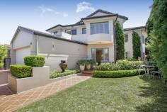  22 Spring Street Abbotsford NSW 2046 The height of contemporary luxury Built and maintained to meticulous standards, this luxurious as-new home rests in an exclusive bayside enclave surrounded by parkland. Sophisticated interiors are embraced by lush landscaped gardens with an innovative layout featuring a central atrium, upper level gallery, custom kitchen and luxurious master wing.  - Private manicured gardens, double-height entry vestibule - 4 king sized beds with built-ins, 3 luxurious bathrooms - Master wing, ensuite and walk-in robe, soaring ceilings - Fluid living and dining, gas fireplace, family room/study - State-of-the-art custom Corian kitchen, Smeg appliances  - Lush north facing garden, sun-drenched dining terrace  - Brushbox floors, ducted air, internal access to auto DLUG  - Stroll to village cafes, 600m to the ferry and boat clubs Co-agent -  Roger Mickhail 0414 650 048 roger@rogermickhail.com.au General Features Property Type: House Bedrooms: 4 Bathrooms: 3 Land Size: 455 m² (approx) Outdoor Features Garage Spaces: 2 Contact Agent 