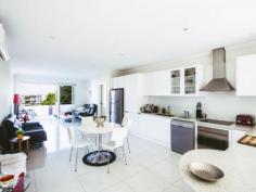  11B Alexander Ave, Taren Point, NSW 2229 Only 3 years young, quality cannot be 
passed stepping into the large combined open plan and dining room 
showcasing a contemporary large kitchen with Ceaser stone bench tops and
 stainless steel Smeg appliances. The open plan lounge and dining has 
its own balcony with panoramic views across Botany Bay and glimpses of 
the City skyline. 
 
On the highest level of this property is a favourable sized yard for all
 or an ideal start for a permaculture vegetable garden, perfect for a 
sustainable future. 
 
Prime points: 
- City skyline and Botany Bay views 
- 2 bathrooms and 3 wc 
- Ducted stainless steel Smeg range hood 
- Three bedrooms include a master with ensuite and balcony 
- 2 entertaining terraces front and rear 
- Massive and impressive storage room 7.1m x 5.5m 
- Down lights through out 
- Air conditioning, built in wardrobes in bedrooms 
- Video intercom and alarm 
- Lock up garage plus car space and off street parking 
 
Only 1km away to Sylvania Waters shopping village where you will find a 
quality butcher, the trendy Lucy's Cafe Espresso, hairdresser, post 
office and directly opposite is Taren Point bowling and recreational 
club. 
 
Quietly positioned across from the Woolooware Shores Anglican retirement
 Village, this quality double brick duplex represents top quality 
finishes. 
 
Council $1099.00 pa 
Water $320.00 pq 
Insurance $985.00 pa 
 
Rates are approximate only. 
 
   