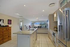  32/1 Grenada Way Kawana Island Qld 4575 Located in the luxurious Leeward Apartments on Kawana Island, this large 3 bedroom apartment boasts 181sqm of living space plus double car secure basement parking. Situated on the 3rd floor with lift access and views over the pool makes this a must to inspect. Main features include: * Large north facing balconies * Open plan living * Central island kitchen with quality appliances * Granite benches throughout * Ducted zone control air-con * Huge master bedroom with ensuite and WIR Leeward facilities include: -Lap pool, recreational pool and spa -Full gymnasium -Full size sauna -Full size tennis court -Large storage units for bikes, kayaks and the like Apartments this size just aren't being built anywhere on Kawana Island or surrounding areas. Whether you buy to live in now or place in to the rental pool your investment will benefit from the anticipated growth from the Kawana Medical precinct. Investors note - expected weekly rent is $470 to $480/week. The apartment has been very well maintained and to date provided a strong return on the owner's investment. It's a reluctant but necessary sale and owner will consider all realistic offers.   