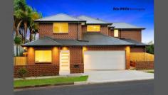  60 Boronia Street, Ermington, NSW 2115 Exclusive architecturally designed residence offering a genuine and extremely rare double garage with off street parking for up to 4 cars. BRAND NEW and situated on the highly sought after riverside of Ermington offers an idyllic family haven. This brilliant property boasts; - 4 bedrooms with ensuite & walk-in robe to the main - Bright & spacious open plan lounge & dining with solid timber flooring - Quality gourmet kitchen with SMEG Stainless Steel appliances, Butler's pantry and Caesar stone breakfast bar - Massive internal laundry with loads of cupboard space - Fully alarmed, ducted reverse cycle A/C and vacuum throughout - Private, sun drenched child & pet friendly rear & side yard - Minutes walk to bus stop, George Kendall Riverfront reserve and shops 