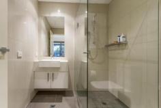  5&6/353 Springvale Road, Glen Waverley, VIC 3150 This luxuriously appointed bespoke apartment comprising of two combined apartments(separate titles) is arguably the finest ever offered in Glen Waverley. Situated within the GWSC zone and a short stroll to The Glen. Featuring a huge 192sqm of living space, including a stunning hostess kitchen with Miele appliances, large living and dining room, an adjoining north facing sunroom and a separate home theatre room. There are 3 bedrooms, 3 bathrooms, 4 car garage and an abundance of storage rooms.  - Full height tiled bathrooms. - Imported Italian Porcelain floor and wall tile. - European Hansa Grohe tapware. - Stone benchtops in kitchen, bathrooms and laundry. - Miele kitchen including gas cooktop with wok burner, electric induction glasstop hotplate, electric self cleaning under bench oven and separate steam induction cooker and DWHR - High efficiency bespoke stainless steel rangehood ducted to outside. - Imperite kitchen cupboards with glass overhead cupboard doors. - Walk in shelved pantry with appliance bench and prep bench. - RC electric low energy use RC heating/air-conditioning units in all bedrooms, living area and home theatre room. - Tinted high efficiency toughened glass to all windows and sliding doors. - Crimsafe aluminium security slider to courtyard. - 2700mm high ceilings throughout with noise reducing insulation. - Glazed aluminium framed bi-fold doors between living/north facing sunroom and sunroom/external private courtyard. - Cantilever glazed roof canopy over north facing courtyard. - LED downlights. - Separate metering, switchboards and services for apartments 5 & 6. - High efficiency gas instantaneous hot water units for each apartment. - Wet bar in sunroom with sink, bench cupboards and overhead unit with glass racks. - Soundproofed home theatre room with blackout curtains. - Dual roller blind system on all windows one with privacy material and one with full blackout. - Onsite concierge 7 AM to 11 PM 365/7 days. - Use of Quest gym at any time and use of Quest conference room by booking with Quest. - Common areas cleaned daily by Quest staff. - Garbage chute to basement compactor. Bin emptying by Quest staff. - 24 hour security tag access to basement, main entry, Frank street entry and lift lobby. - Basement fireproof lockup store room 25 sqm. With storage shelving exclusively licenced to apartment 5. - 2 wire security storage cages in basement on title. - 4 car parks in basement directly in front of lift lobby on title. - Lockable coat cupboard on title in corridor next to entry door apartment 6. - Fireproof lockup wine cellar 25 sqm. On ground level next to lift. - CCTV throughout complex   