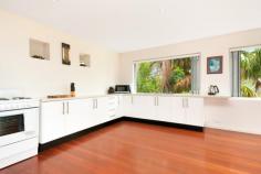  35 Alleyne Avenue, North Narrabeen NSW 2101 Look no further than this unique family home close to the beach and lake, shops and city transport. Over three levels there are many, many accommodation options for both family home and visitors. In total there are six bedrooms, four living areas, three bathrooms, a deck/outdoor entertaining area on each of the three levels all enjoying beautiful views of the entrance to Narrabeen Lake and the surrounding district. The aspect is fantastic with a North East orientation to capture sun and cooling breezes all year round. 