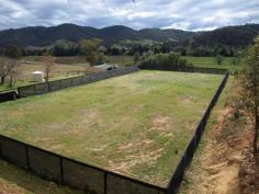  83 Dungowan Creek Rd Dungowan NSW 2340 Situated in the picturesque Dungowan Valley, approx 27km to Tamworth CBD. The
 property has a great mixture of creek flats and hill grazing. With 
approx. 25 Acres of extremely productive creek flats you have the 
potential to grow Lucerne or seasonal crops. The remaining approx. 37 
Acres is hill grazing. The property
 has more water than you will ever need. Single frontage to The Dungowan
 Creek, a 78 megalitre irrigation licence from an equipped electric 
well, 3 phase power connected. The well is also equipped with a stock 
and domestic pump that pumps to a storage tank and feeds troughs. The 
property is also connected to the Dungowan pipe line and 10,000 gallons 
rain water storage. Water will never be a problem. Current owner runs 26 cows and calves all year around plus a bull and 1 horse. The property is currently fenced into 5 main paddocks. Comfortable
 2 yr old hardiplank home consisting of 2 bedrooms, large kitchen with 
dishwasher and plenty of storage, separate lounge plus a sunroom/office 
and spacious verandah overlooking the Dungowan creek. The property has 
more than adequate shedding with a large 4 bay machinery shed with 1 bay
 enclosed workshop (approx. 8000 bales) plus another 4 bay shed with 1 
bay enclosed for tack/feed room, this shed was previous used for stables
 and still has rubber on the internal walls, easy to convert back to 4 
stables. Large sand working arena (approx. 50 x 20m) and timber/steel 
cattle yards with head bale and loading ramp. 