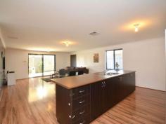  53 Barnevelder Bend Southern River WA 6110 $495,000 There is almost a blank canvas for you to 
put your own style to this near new family home. This spacious 
air-conditioned, three bedroom two bathroom home is situated opposite a 
beautiful park and although roomy it is easy care for the busy family. 
 
The main bedroom has a dual entry wardrobe that continue through to the 
ensuite bathroom with everyone's dream, a separate toilet. 
 
French doors lead into the theatre room that is larger than some in homes of this size. 
 
A galley kitchen overlooks the spacious dining/family area. This in turn
 leads out to the gabled patio area, roomy enough for a party or two in 
the coming summer months. The fridge area is plumbed for the fridge and 
gas hotplates, electric oven and pantry also compliment the kitchen. 
 
Wooden flooring has been layed throughout the living area with carpets in the bedrooms and theatre room. 
 
Sutherland Park is close by and this property is situated within close proximity to and both Albany Highway and South Street. 
 
Don't miss out on this property. Come along to the Home Open and see all the features for yourself. 