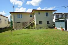  144 Talbot St Berserker QLD 4701 $299,000 This one owner highset cabinboard home is in a handy Northside location close to schools, major shopping centres & transport. The home has 3 bedrooms (main with A/C), A/C open plan lounge/dining, original kitchen & bathroom. Covered front patio with views of the Berserker Mountains to sit & enjoy a cool summer drink or a cup of tea all year round. The home is enclosed & fully lockable under with 2 car accommodation. The level allotment is fully landscaped & fenced. Be quick this is sure to sell! - See more at: http://www.professionalsrockhampton.com.au/real-estate/property/755895/for-sale/house/qld/berserker-4701/144-talbot-street/#sthash.jrnGNUTG.dpuf 