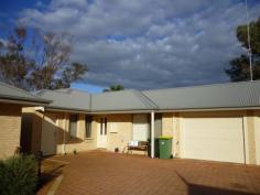  5/9 Joaquina Street York WA 6302 A Unit For Sale in York?! Very rare opportunity to purchase an easy care modern unit in York!  This 3 bedroom unit boasts a single garage with an additional carbay, an open kitchen/family/meals, seperate lounge room, 2 toilets, split system airconditioning, big courtyard and a store room. The short walk to the shops from here is as easy as you will find.  Buy now as an ideal investment, future retirement planning or just to downsize to an easy care home. Currently lease to the government (GROH) until January 2015. To view this property, please call:  Brian Wheeler - 0429 119 123 LJ Hooker York General Features Property Type: Unit Bedrooms: 3 Bathrooms: 1 Building Size: 105.00 m² (11 squares) approx Land Size: 227 m² (approx) Price per m²: $1,454 Indoor Features Ensuite: 1 Living Areas: 2 Toilets: 2 Built-in Wardrobes Dishwasher Split-system Air Conditioning Outdoor Features Garage Spaces: 1 Open Car Spaces: 1 Courtyard 