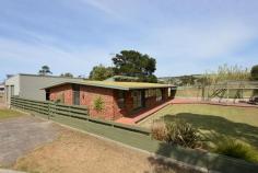  6 Meyer Street, VICTOR Harbor SA 5211 This significant land holding of some 2023sqm comprises two titles on a corner location, fronting both George Main Road and Meyer Street for two street access. Zoned light Industrial the opportunity exists to run your own business from home. Living on site provides extra security and flexibility. The main home offers 3 bedrooms, the master with new en suite plus study. The formal lounge and family rooms are separated by the central kitchen with ample bench and cupboard space and central island. The formal lounge offers doors to the immaculate back garden with pergola, tiered rock retained gardens and bowling green lawn. 