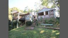  565 Eumundi - Kenilworth Road Eerwah Vale QLD 4562 Introducing…..Charm & Charisma A warm and inviting country feel as you enter this property. A timber home with raked ceilings, beautiful polished timber floors and plenty of light throughout. Situated on over 2 acres with a country view outlook from most rooms. A kitchen positioned perfect with gas cooking and plenty of bench space and cupboards for any home cook. The lounge and deck invites you to share a cuppa with family & friends in peace and privacy. Other key features of the home are; * Air conditioning & Fans throughout * Good sized main bedroom with en-suite * Nicely elevated with country outlook * Plenty of space for the keen vege gardener * Positioned close to Eumundi township Enjoy the sound of tranquillity and book your inspection today. General Features Property Type: House Bedrooms: 3 Bathrooms: 2 Land Size: 0.97ha (2.39 acres) (approx) Outdoor Features Carport Spaces: 2 