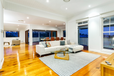  29 Tooth Ave Paddington QLD 4064 Magnificent residence on 1447m2 - 3 lots - in the heart of Paddo! Positioned in the heart of Paddington on 3 allotments with the 3rd unencumbered this Queenslander, magnificent by design, offers you the ultimate lifestyle in a blue chip position complete with swimming pool and even room to complete the picture with a tennis court. Set over two levels, basking in a sought after north-eastern light with panoramic views to the city and surrounding Paddington district, the elevated stance invites balmy breezes in all year round. Entry level * Expansive open plan formal living and dining spills out to entertainers deck overlooking the sparkling pool and breathtaking views  * Gourmet kitchen with feature island bench, beautiful stone bench tops, soft close cabinetry; abundant storage and work space an Epicurean's delight * Family meals area * Luxurious parents retreat with feature bay window, lounge/study area, walk-in dressing room and indulgent ensuite * 2nd bedroom with built-in cupboards is conveniently position to the guest bathroom  * 6th bedroom/Nursery or home study  * Utility room in close proximity to the kitchen Descending internal timber staircase * Family living / rumpus area centrally located to the bedrooms on this level flows out to deck and swimming pool * Three huge bedrooms, all with built-in cupboard * Large family bathroom  * Laundry with linen storage * Under-stair storage perfect place to store your wine collection * Internal access from double remote control garage Features * Substantial family home in blue chip position on 1447m2; a once in a lifetime opportunity for you to make this your family's heritage * Build the tennis court, or hold the lot and reap the rewards years on * Queenslander character features perfectly infused with contemporary design * Soaring ceilings, polished timber floors, warm welcoming neutral palette * Ducted reverse cycle air-conditioning, alarm system * Easy-care landscaped surrounds with plenty of space for back-yard cricket by the pool * Fully fenced with remote control vehicle access and keyed pedestrian gate. On the doorstep of Paddington's renowned cafe and boutique shopping precincts, you will find Rosalie village, Suncorp Stadium and the City centre in close proximity. Perfectly positioned to highly regarded private and public schools. 29 Tooth Avenue offers you a rare opportunity to secure your family's future today and appreciate a sought-after lifestyle of relaxed sophistication in the heart of Paddington. Please call Rachael Spinks on 0411 10 10 15 or (07) 3368 1298 to arrange a viewing 