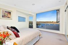  42 Fernleigh Rd Caringbah South NSW 2229 Ideally positioned in one of Caringbah South's most exclusive locations, this stunning architecturally designed residence offers breathtaking Burraneer Bay views. With an emphasis on contemporary style this home offers elegance and sophistication throughout. Superior appointments..no expense spared. An array of formal/casual entertaining areas. Four large bedrooms plus an open plan office and pool. A self contained area and parking for 3 cars. Land size 893 sqm. 