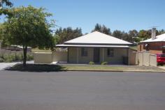  1/18 Mclachlan Street, Orange NSW 2800 Single storey 2 bedroom, 2 bathroom villa with large "L" shaped veranda. Quality kitchen with new appliances. Off street carport at the rear of the villa. Quiet, peaceful position with the advantage of the property is backing onto Ridley Oval. There is a large lawn area on common property, useful for BBQ with friends and family. Close to schools and shops with easy access to Mitchell highway and main streets of Orange. Currently leased to a quality tenant at $290.00 pw FOR INSPECTION: Please contact Koo Yamaguchi to arrange an inspection 