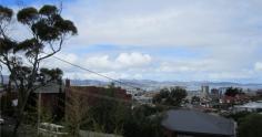  1/8 Lochner Street West Hobart TAS 7000 Lovely city views This light and bright one bedroom unit is situated on the top storey of this small complex of only four well maintained units. The unit comprises of separate loungeroom that leads through to the kitchen area that has plenty of storage and room for a small table and chairs, with lovely views of Hobart City. There is a good sized bedroom with built in robes . The bathroom has a shower over the bath and laundry fittings and a large linen cupboard to add to the storage already available. The unit also comes with a fridge and washing machine and a lock up garage. The gardens are maintained so your weekends are your own to sit back, relax and enjoy the views. (Sorry no pets)  *** AVAILABLE NOW *** • To arrange an inspection of this property, please visit the Edwards Windsor website (ewre.com.au) and book online. • To view our entire catalogue of properties available for rent, or join our popular Renters Club, please visit our website (ewre.com.au), click on Residential Rentals and Properties for Lease. • You can also download a Tenancy Application Form or apply online via the Edwards Windsor website (ewre.com.au). *** EDWARDS WINDSOR ... show more General Features Property Type: Unit Bedrooms: 1 Bathrooms: 1 Bond: $800 Indoor Features Living Areas: 1 Toilets: 1 Outdoor Features Carport Spaces: 1 $200 per week 