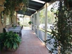  81-83 Scarvell Place Kooralbyn Qld 4285 $415,000 This immaculate brick 4 Bedroom 2 bathroom home on 4876m2 acreage land is pure joy to list.
 Situated in a rural setting with lifestyle facilities, this is a home that needs to be inspected to appreciate.
 The large kitchen with enormous amount of cupboard space, has open 
plan access to the living, media room, and formal lounge area. This has 
been beautifully decorated, made spacious, airy, and invites the outside
 in with large windows and glass doors. The covered and screened 
Patio the length of the home opens from these rooms, is the ideal area 
for entertaining, and where most Queenslander's live year round. The 
present owners watch the wildlife daily from here.
 The bedrooms are large, all with built ins, and the 
presentation of these rooms is a delight. The main bedroom has an 
ensuite and opens to the patio for morning coffee. The main bathroom has
 separate toilet.
 The above ground pool is fully fenced and easily accessible to the patio area.
 It is the paved barbecue area under the large jacaranda tree just 
off the Patio, which gives thoughts of evening drinks, with friends and 
family.
 There is a double lock up garage with access into the home.
 Additionally a "Man's Shed" 7 x 5.5 m with extension workshop.
 All the gardens have been landscaped and the driveways are 
immaculate, with separate entrance to the Man shed. There is also access
 here for a motor home or caravan.
 The back area of this acreage property, has been fenced to run a children's pony or horse with plenty of accessibility.
 This is a must see property
 Local Agent has exclusive listing and lives 2 mins away, so viewing is at any time.
 Rosemary Lawson-Quinn
 Servicing the Kooralbyn Area. 